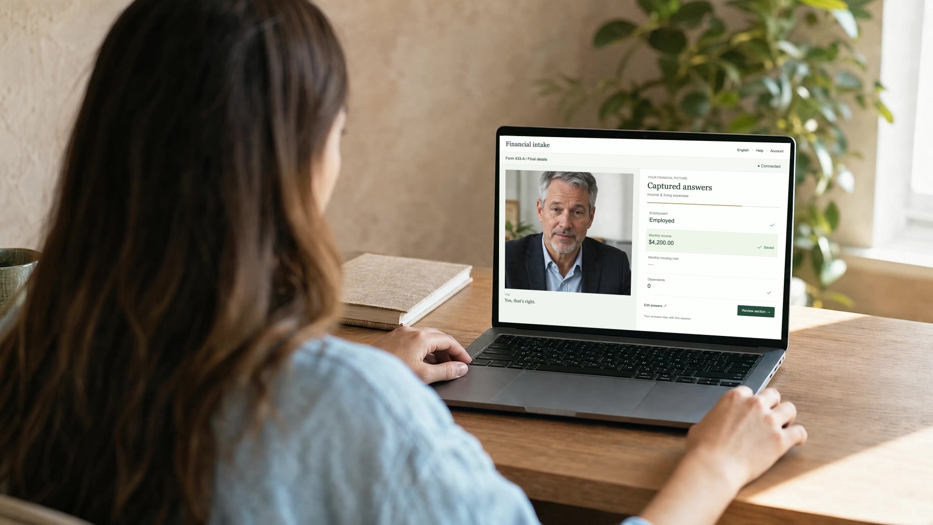 Advisor reviewing an AI-assisted financial intake experience with a customer